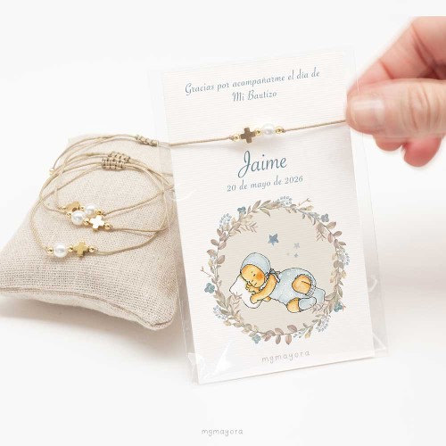 mgmayora | pulsera detalle de bautizo de hilo ocre, con cruz de acero dorado y una perla